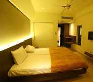 Bedroom 7 Hotel Grand Parivaar