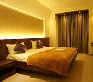 Bedroom 6 Hotel Grand Parivaar