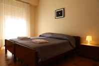 Kamar Tidur Cozy Bed&Breakfast