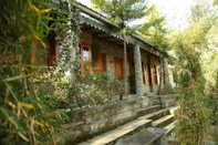 Phòng ngủ Ayush Cottages by OpenSky