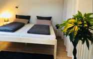 ห้องนอน 4 Ferienwohnung zum Schlosspark Calden