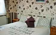 Kamar Tidur 7 The Kensington Guesthouse