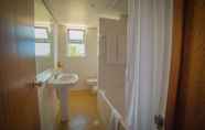 Phòng tắm bên trong 5 Hotel Porto Santo & Spa