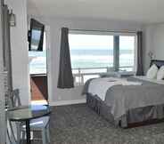 ห้องนอน 7 Beachfront Manor Hotel