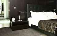 Kamar Tidur 6 Axis Viana Business & SPA Hotel