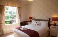 ห้องนอน 4 Woodlands Lodge Hotel
