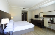 Bedroom 2 Ramada by Wyndham Downtown Beirut