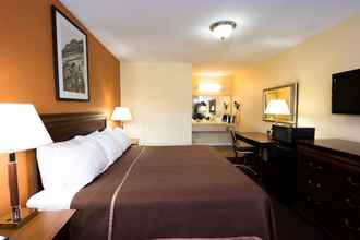 Bedroom 4 Travelodge by Wyndham Grove City / So. Columbus