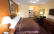 Bedroom 3 Travelodge by Wyndham Grove City / So. Columbus