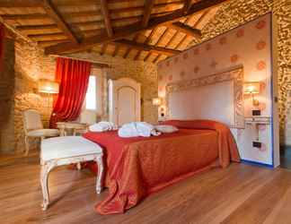 Bedroom 2 Oste del Castello Wellness & Bike Hotel