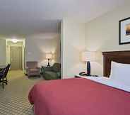 Kamar Tidur 2 Country Inn & Suites by Radisson, Wilmington, NC