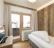 Bedroom 7 Angerer Alpine Suiten und Familienappartements Tirol