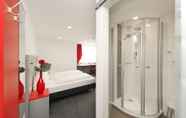 In-room Bathroom 4 Best Western Plus Aalener Roemerhotel
