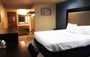 Kamar Tidur 2 Woodridge Inn and Suites