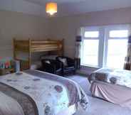 Bedroom 4 Harepath Holidays Limited