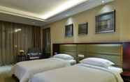 Bilik Tidur 6 Yiwu International Mansion Hotel