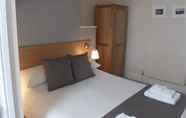 ห้องนอน 5 Powys Lodge