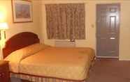 ห้องนอน 2 Caravan Inn Motel