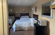 ห้องนอน 4 Caravan Inn Motel