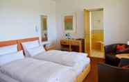 Kamar Tidur 4 Hotel Alpenblick Garni