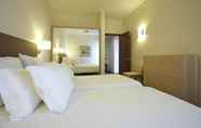 Bilik Tidur 3 Hotel Girassol - Suite Hotel