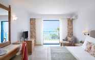 Bedroom 4 Mitsis Rinela Beach Resort & Spa - All Inclusive