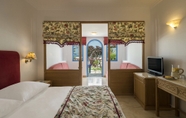 Bedroom 6 Mitsis Rinela Beach Resort & Spa - All Inclusive