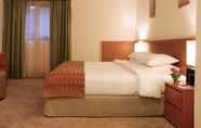 Kamar Tidur 7 Ramada Hotel & Suites by Wyndham Ajman