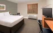 Bedroom 6 WoodSpring Suites Greenville Simpsonville