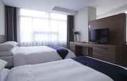 ห้องนอน 4 Ramada by Wyndham Dongtan Hotel