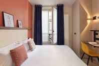 Phòng ngủ Hôtel Le Petit Belloy St Germain