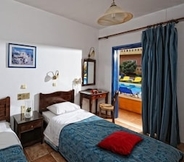 Kamar Tidur 6 Aegean Sky Hotel & Suites