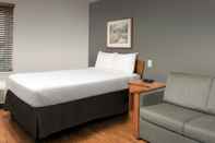 Phòng ngủ Extended Stay America Select Suites - Orlando - South