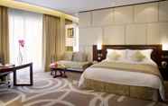Bedroom 7 New World Dalian Hotel
