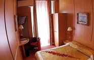 Bedroom 3 Hotel Victoria au Lac