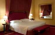 Bedroom 2 Maxim Hotel