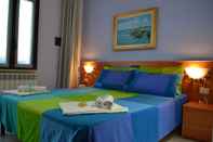 Phòng ngủ Villa Vacanze Paradiso