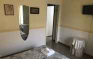 Kamar Tidur 3 Ad Centrum B&B di Fraccaroli Fabio