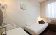 Kamar Tidur 4 Townhouse Hotel