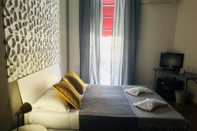 Bedroom B&B Stesicoro InHabit- Guesthouse City Center