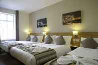 Bedroom Kings Cross Inn Hotel