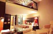 Kamar Tidur 5 Enjoying International Hotel