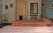 Kamar Tidur 4 Bed and Breakfast D'Angelo