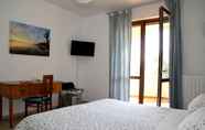 Kamar Tidur 4 La Rosa Blu Bed & Breakfast