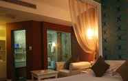 Kamar Tidur 5 Elegance Bund Hotel