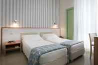 ห้องนอน Hotel Calypso