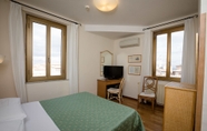 Phòng ngủ 4 Hotel Duomo
