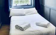 Kamar Tidur 4 The Excelsior Hotel