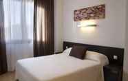 Bedroom 6 Compostela Suites Apartments