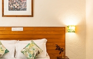 Phòng ngủ 3 Bambolim Beach Resort